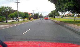 The speed limit on this road is 90 km/h. You have just overtaken a vehicle in the left lane. What should you do next? - The speed limit on this road is 90 km/h. You have just overtaken a vehicle in the left lane. What should you do next?